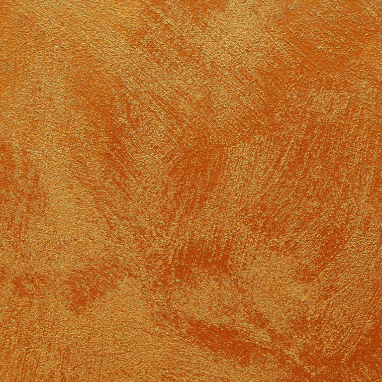 Wand in Orange, gestrichen mit einer Kreativtechnik